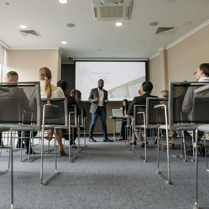 Audience engaged in productive learning workshop session