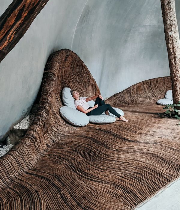 Creative young woman with light hair wearing artistic casual clothing