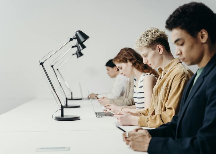 Modern collaborative workspace with team working on productivity projects