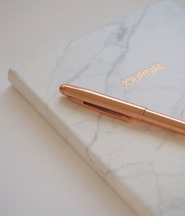 Notebook with Cornell note-taking method diagram and organized sections