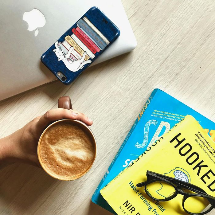 Organized workspace with books and productivity tools for effective learning