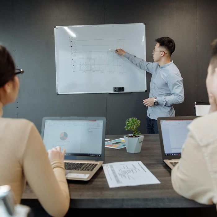 Professional presenting at educational conference