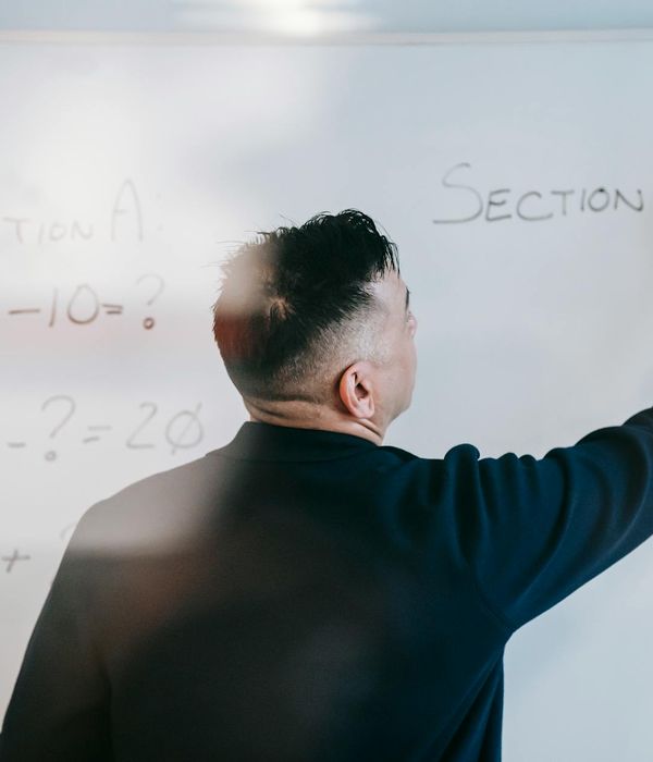 Student explaining complex concept using Feynman learning technique